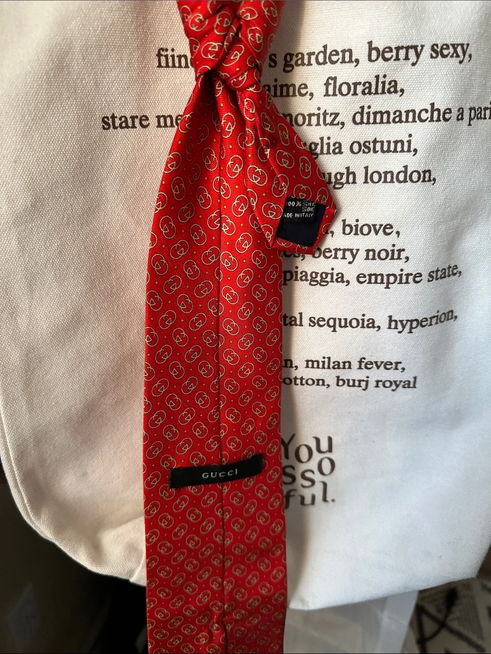 Designer Gucci Red Silk Tie with Subtle Logo Medallions